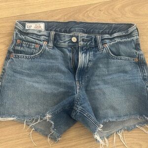 GAP Raw Hem Low Rise Stride 4” Distressed Denim Shorts - Faded Blue